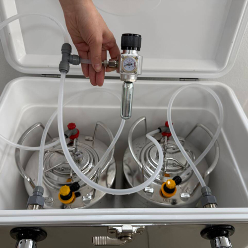 Nevera/enfriador portátil de acero inoxidable con doble grifo